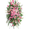 Tall pink floral standing spray on an easel