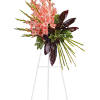 Pink gladiolus arrangement on a white stand