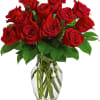 Bouquet of red roses in a clear glass vase