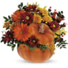 Pumpkin-shaped floral arrangement with orange and burgundy flowers