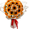 Bouquet of sunflowers and white roses wrapped with a red ribbon