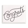 White card with the word "Congrats" in black script