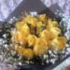 Yellow rose bouquet with baby’s breath, butterfly picks, and a small crown