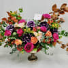 Modern free form premium floral arrangement. Our designer's choice of seasonal high-end