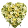 Heart-shaped floral spray with yellow and white flowers