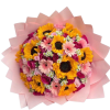Bouquet of sunflowers, pink gerbera daisies, and roses wrapped in pale pink paper