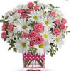 Pink roses and white daisies in a pink polka-dot vase