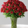 Bouquet of red roses in a clear glass vase
