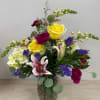 A glorious collection bursting with blooms including, snapdragons, stargazer lilies and hydrangea.