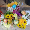 Fresh spring mix of rose, desies, tulips, stuck and ofcause "lucky egg"