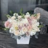 Blush and ivory rose bouquet in a white box vase