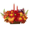Send a stunning Thanksgving Floral Centerpiece for the holiday!

7" bronze or rust-colored
