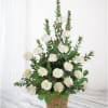 White carnation arrangement in a woven basket