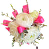 White and blush ranunculus bouquet with bright pink ribbon accents