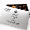 Box of assorted chocolates with a printed lid
