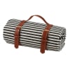 Striped fabric roll bag with brown leather straps and handle