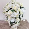 White bridal bouquet with roses, calla lilies, and orchids