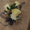 Small bouquet of cream roses with ribbon and baby's breath