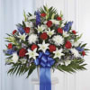 A formal, ceremonial arrangement crafted in bold patriotic hues-the Red, White &amp;