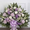 A soft, dignified arrangement that offers quiet comfort - the pedestal arrangement