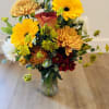 All the best colors of Fall in a beautiful arrangement.
