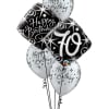 Cluster of birthday balloons with a large "70" balloon
