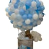 Blue and white balloon arrangement in a wicker basket with a teddy bear