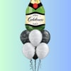 Champagne bottle balloon bouquet with black and white balloons
