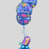 Birthday balloon bouquet with three blue balloons and a mermaid balloon topper