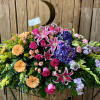 Large mixed floral spray with lilies, roses, hydrangeas, and gerbera daisies