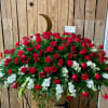 Large red and white floral spray with roses and carnations