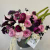 Designed with tones of deep burgundy and vibrant pink to create a