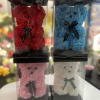 Four rose teddy bears in clear display boxes, in red, blue, pink, and white.