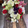 Mixed bouquet of red, white, pink, and purple flowers
