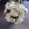 White carnation bouquet with delicate bronze filler