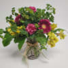 The designer will make a beautiful bouquet of flowers in the price