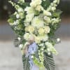 Honor your loved one with our classic Greenwich funeral spray. It sets
