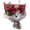 with red roses, carnations, white baby's breath, etc.