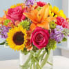 sunflower,hot pink astromerias ,green cushions lovely this flowers