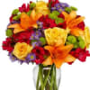 erflowing with yellow roses, orange lilies, green daisy poms, and lavender asters
