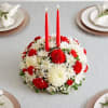 festive Christmas centerpiece. This traditional arrangement is filled with red and white