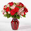 As sweet as candy, this pink and red arrangement is sure to