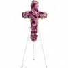 Purple floral cross on a white easel