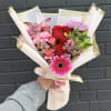 FLORIST CHOICE COLORS. 6 roses, assorted fillers, and greenery. Includes butterfly **