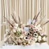 Welcome their new bundle of joy with this breathtaking gift arrangement that