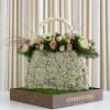 Elevate your floral gifting game with our "Blooms in Vogue Floral Purse"