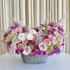 Immerse yourself in a kaleidoscope of hues with our "Vibrant Blooms" arrangement.