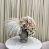 Bring the beauty of nature indoors with this stunning arrangement of ivory