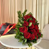 Celebrate a momentous occasion with this breathtaking bouquet of 25 fiery red