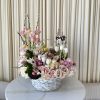 Ring in the Easter season with this delightful basket filled with springtime